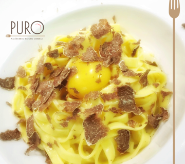 Tagliatelle con tartufo e tuorlo d'uovo